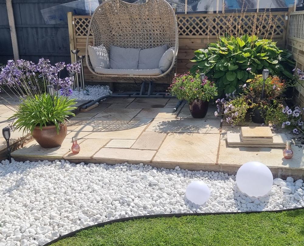 Bags of white store garden stones